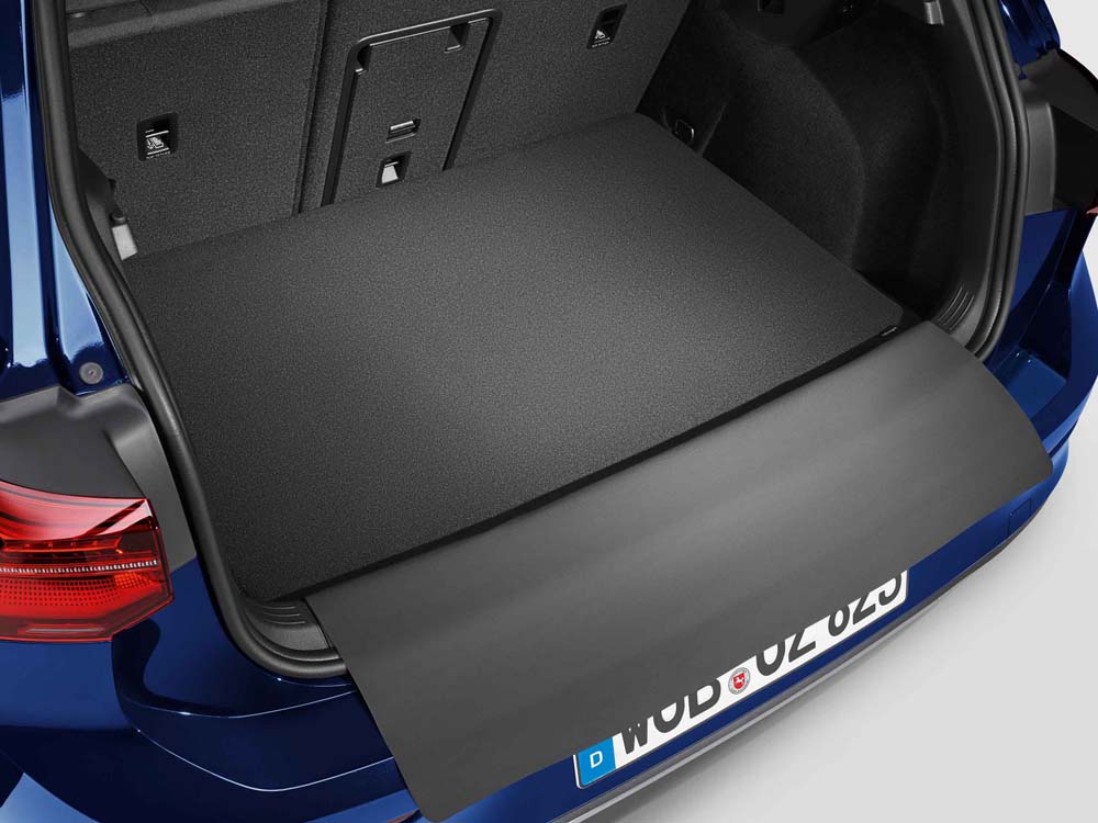 Luggage compartment reversible mat with protective flap