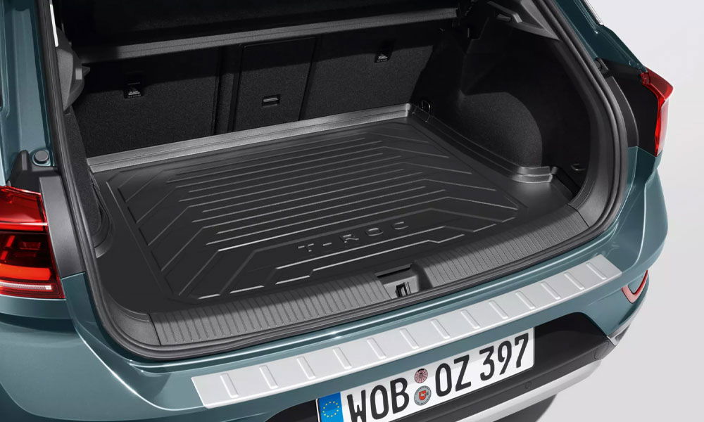 Plastic luggage compartment tray