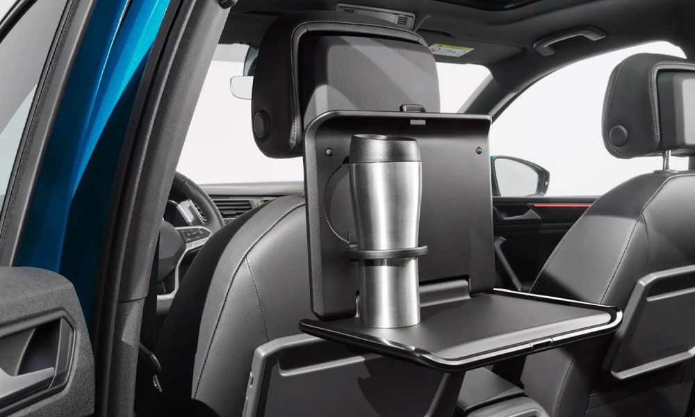 Folding table with cup holder