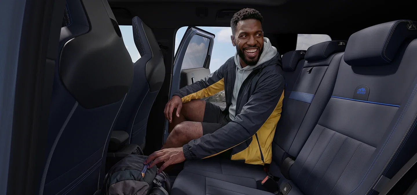 Passenger seated in the MINI Countryman rear cabin.