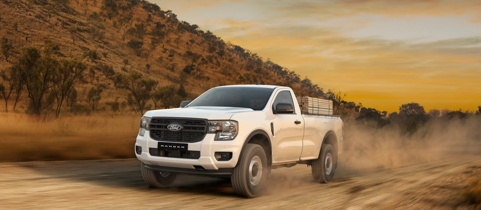 Ford Ranger XL Single Cab driving on a dusty gravel road