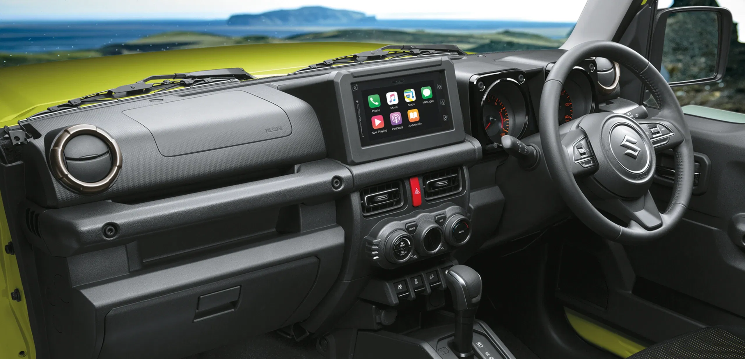 Suzuki Jimny off-roading through rocky mountains