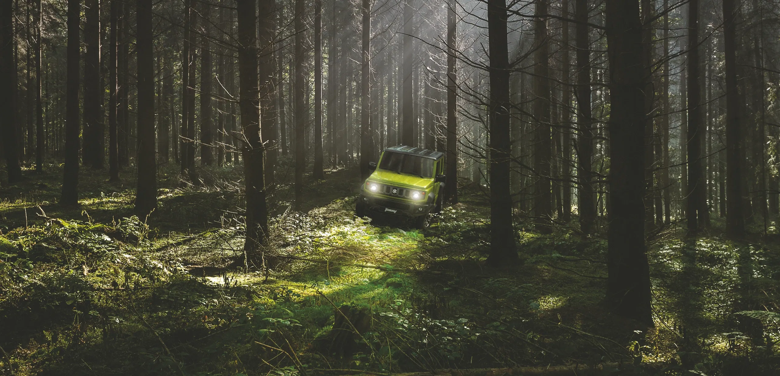 Suzuki Jimny crossing shallow water near the beach