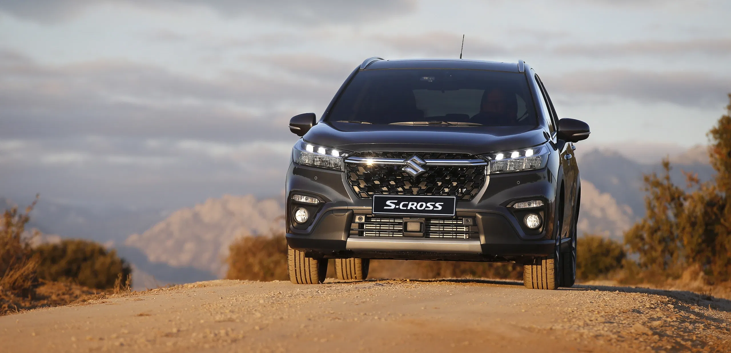 S-Cross SUV driving on a mountain road
